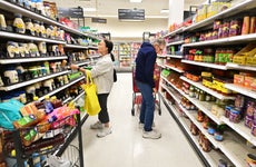 People shop in the food section of a retail store in Rosemead, California