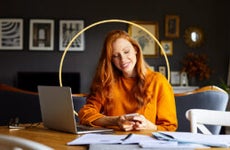 A woman looking at her phone