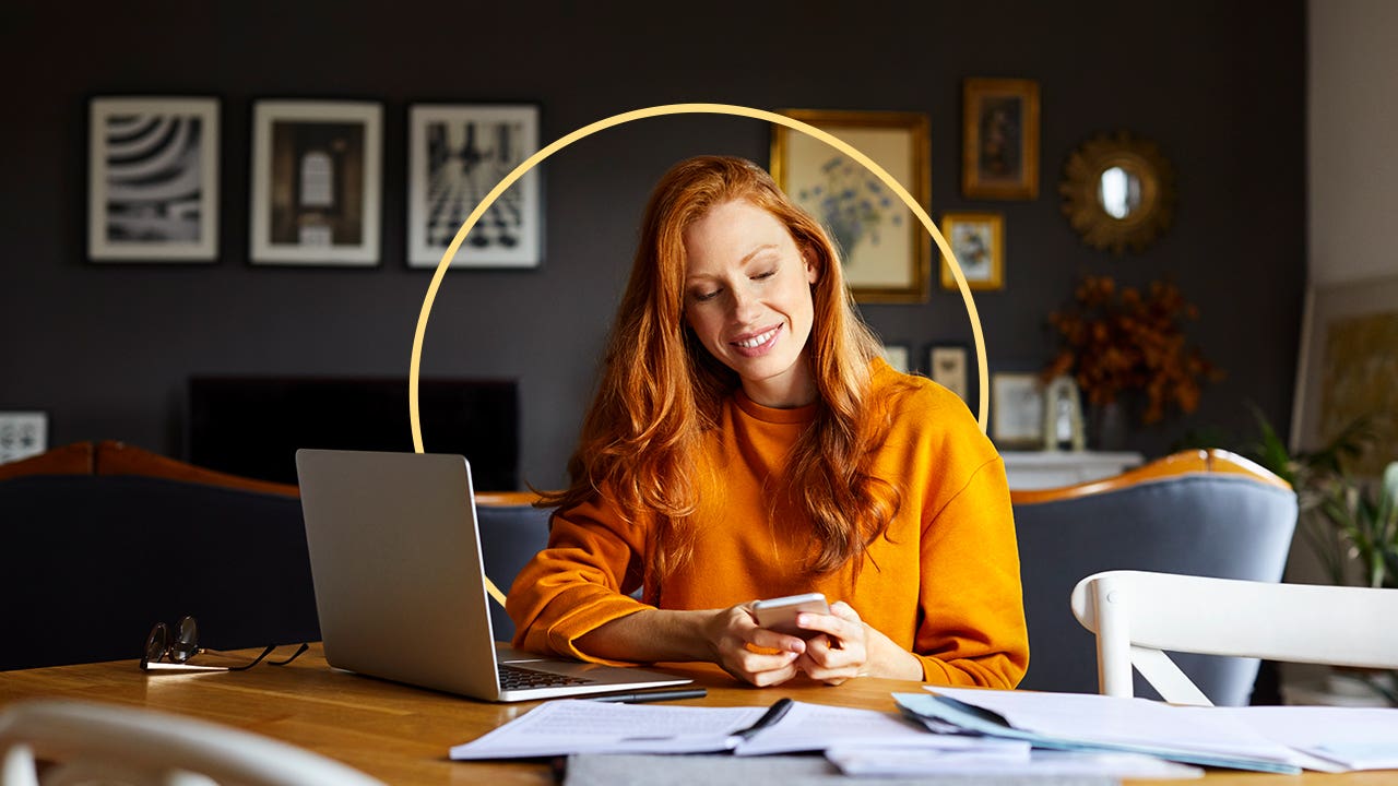 A woman looking at her phone