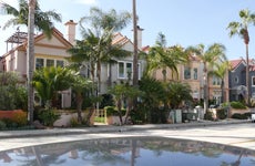 Different colorful houses row on a suburban street in california