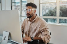 Information technology businessman working on computer in office