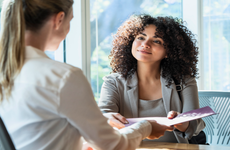 BIPOC woman meeting with female financial advisor