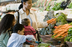 Family shopping at grocery store